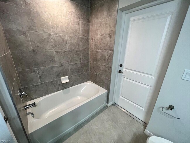 Building Photo - Stunning 4 Bed 3 Car Garage Home Available Now Near Burnt Store Rd