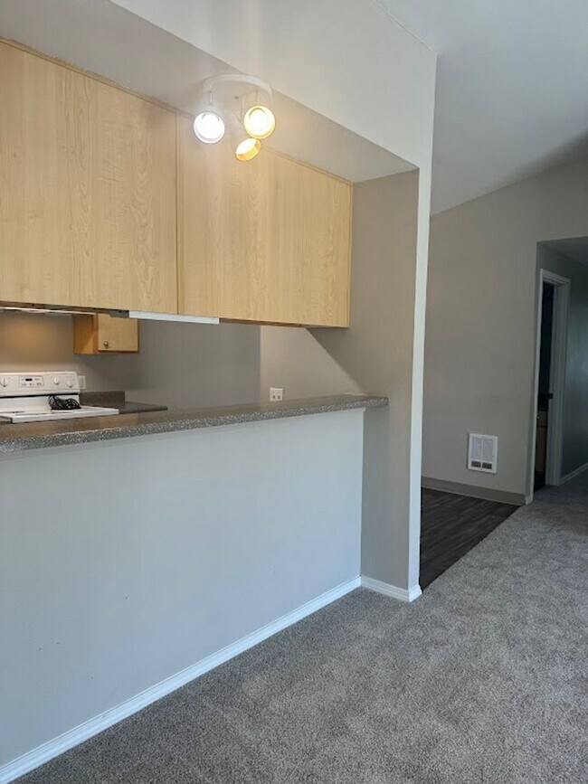 Building Photo - Your New Home Comes with a Move-In Special!