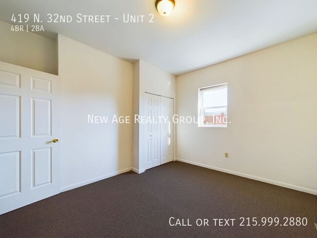 Building Photo - Spacious, Bi-level Apartment Available at ...
