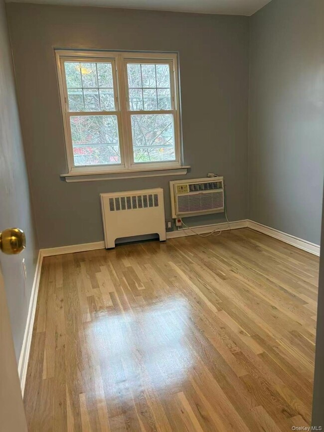 Building Photo - 207-09 35th Ave