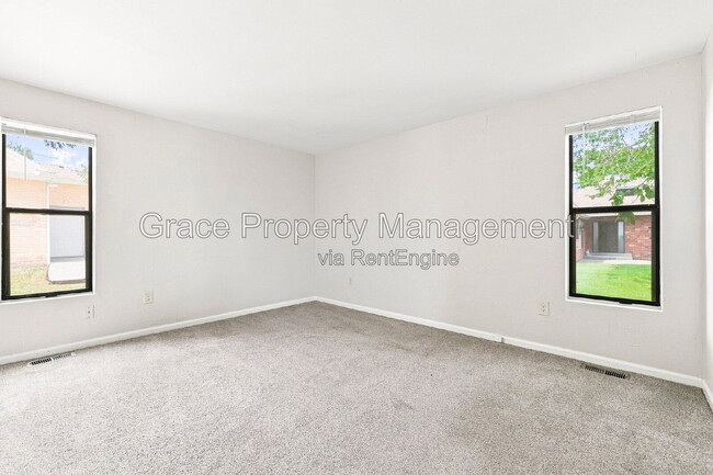 Building Photo - 8917 E Chenango Ave