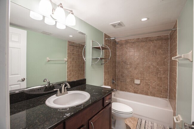 Building Photo - Adorable condo, waterfront view