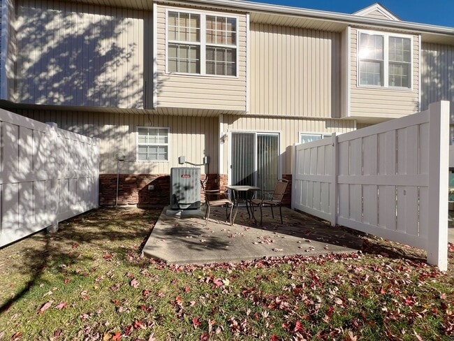 Building Photo - SEE IT NOW: Spacious 2-Bedroom Townhome wi...