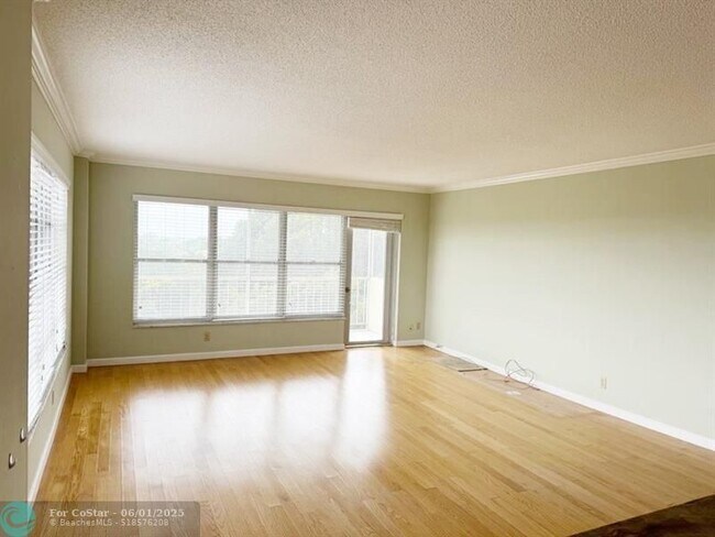 Building Photo - 10777 W Sample Rd
