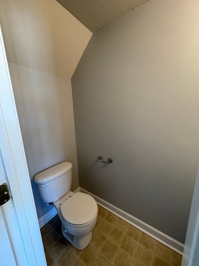 Building Photo - Charming two bedroom one and a half bath town home that is centrally located. Just a short drive ...