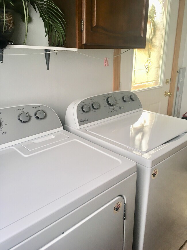 New full-sized washer and dryer - 3061 Maple Ave