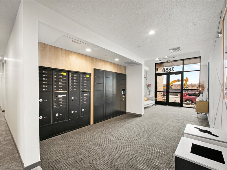 Mail room with secure entry - 3850 E Haystack St