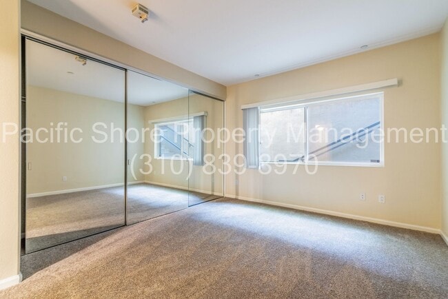 Building Photo - Elegant Westside Condo with Modern Upgrades and Private Patios