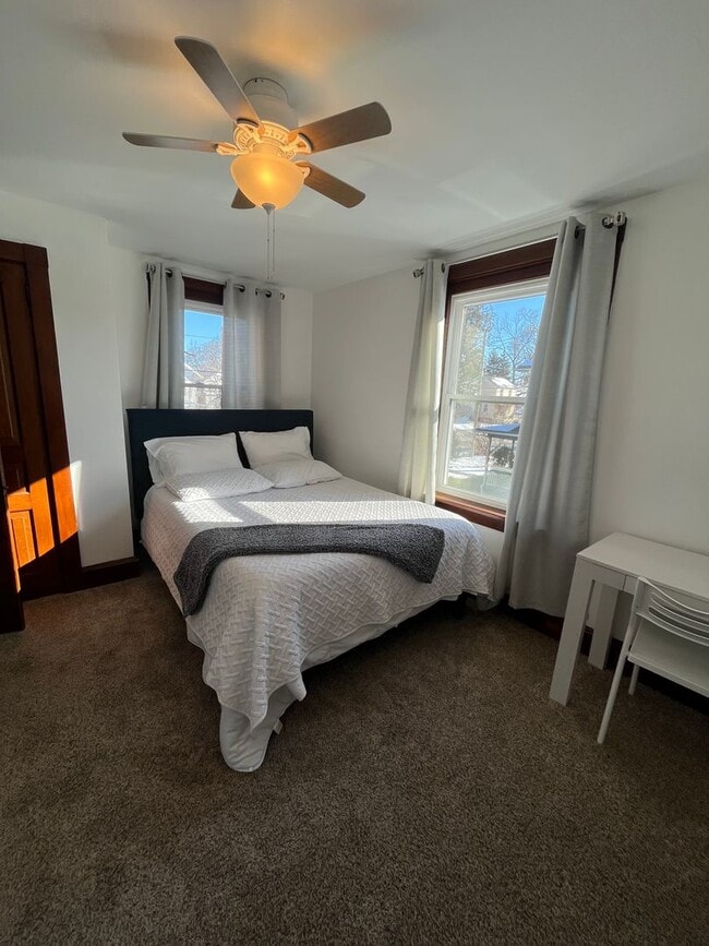 Building Photo - Spacious 4-Bedroom Home with Sunroom, Garage & Private Driveway!