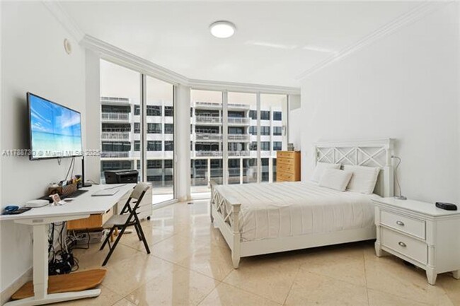 Building Photo - 10225 Collins Ave