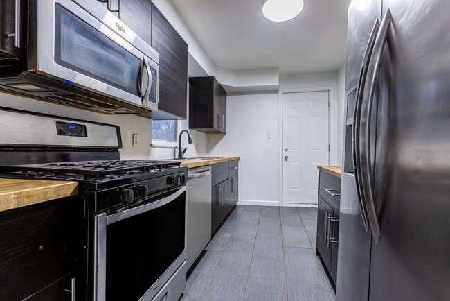 Building Photo - AVAILABLE APRIL - Open Concept 3 Bedroom Home w/ Character Throughout!