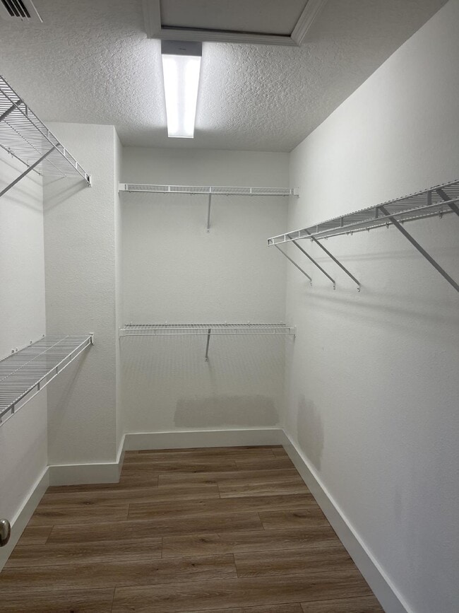 Building Photo - 3/2.5 updated townhome in gated community with 2 car garage