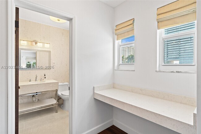 Building Photo - 10190 Collins Ave