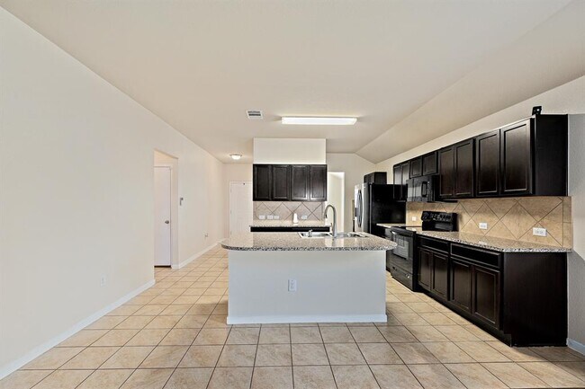 Building Photo - 5916 Montrelia Dr