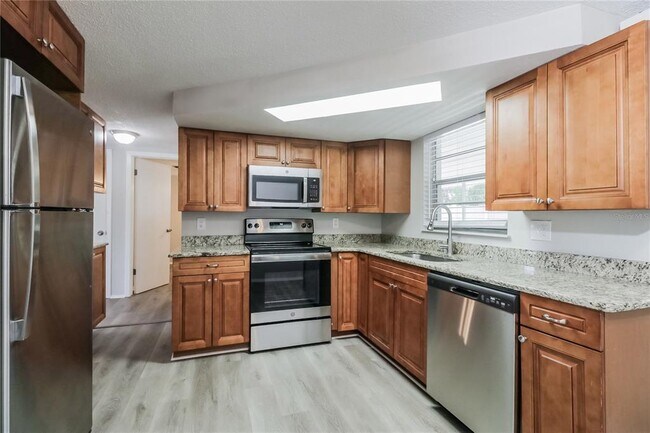 Building Photo - 7224 Parrot Dr