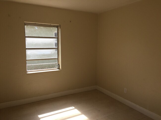 Building Photo - Large 3-2 with a carport