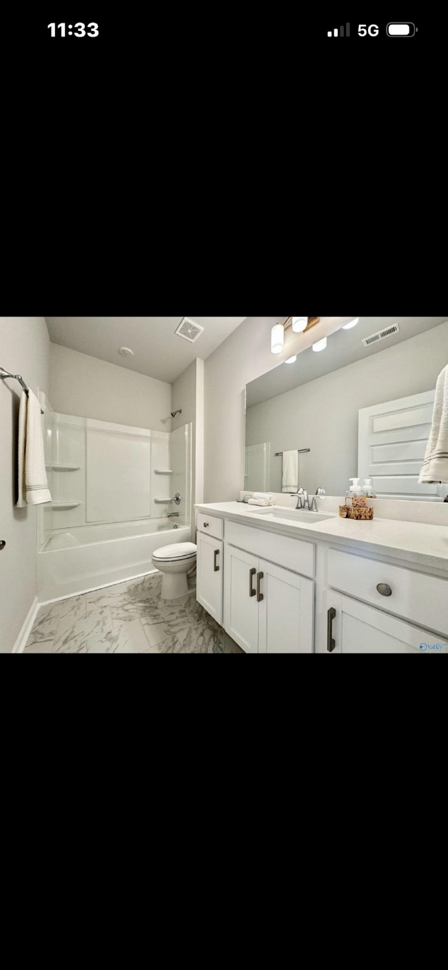 Building Photo - "NEWLY BUILT- Spacious 4-Bedroom Haven with Granite Elegance and Cozy Fireplace in Harvest"