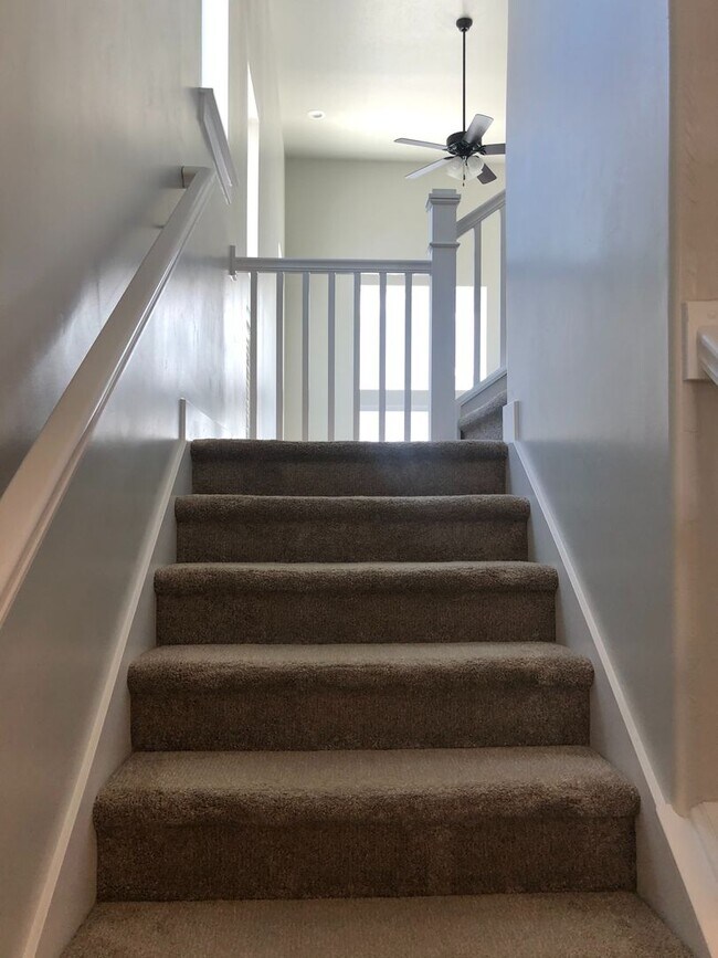 Building Photo - AMAZING HOME IN SOUGHT AFTER EXCHANGE DEVELOPMENT W/ 2 CAR GARAGE