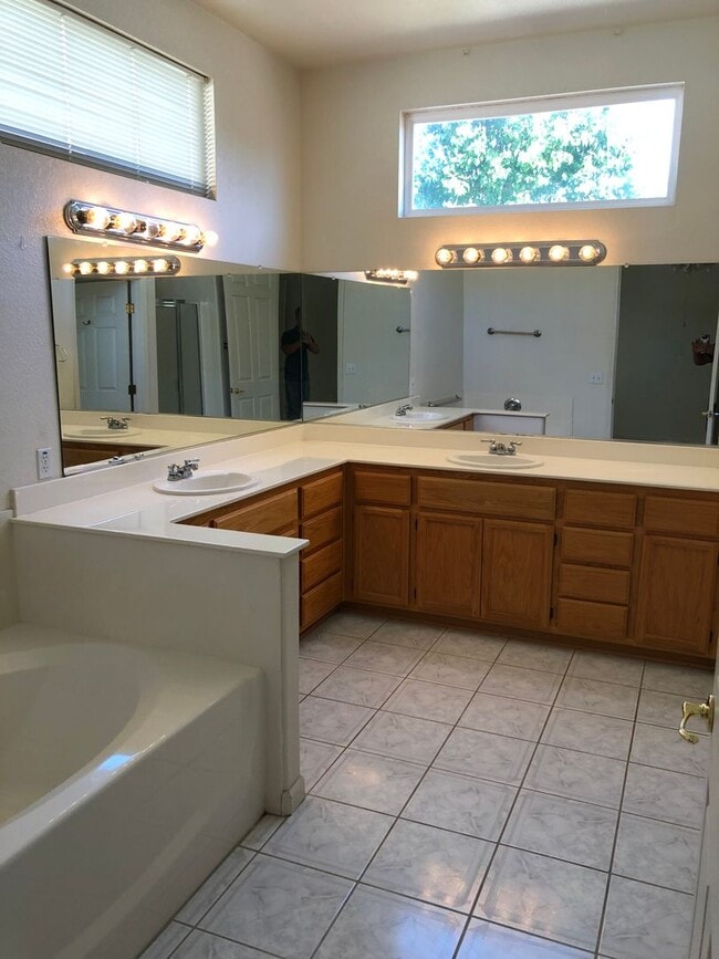 Building Photo - Cute one story in a 55 or better gated community.