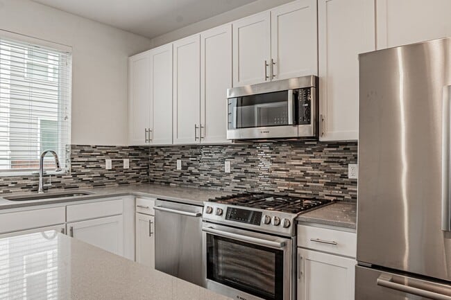 Building Photo - Modern 2BD, 3BA RiNo Townhome with Garage and Rooftop Deck