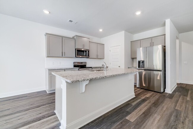 Building Photo - Beautiful 4BR Home in Woodland Trail – Top...