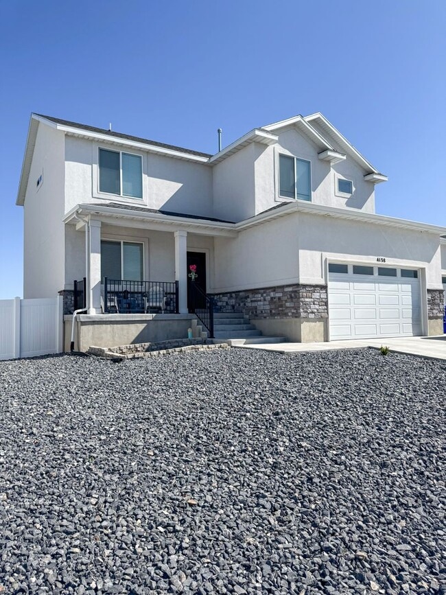 Building Photo - Modern 4 Bed / 3 Bath Home in Syracuse | Bonus Room + Fenced Yard + 86” TV Included