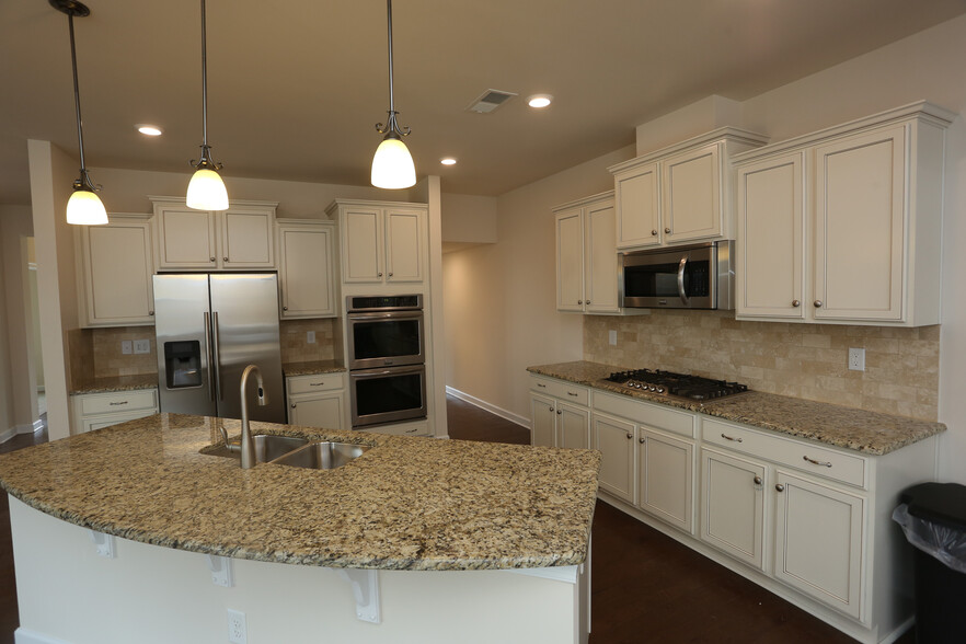 Gourmet kitchen option with all stainless steel appliances, and beautiful granite counter tops. - 2001 Trading Path Lane