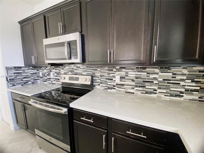 Building Photo - 7879 NW Greenbank Cir