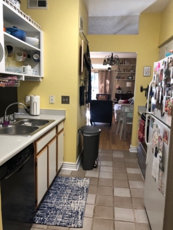 Building Photo - 7410 Singing Hills Dr