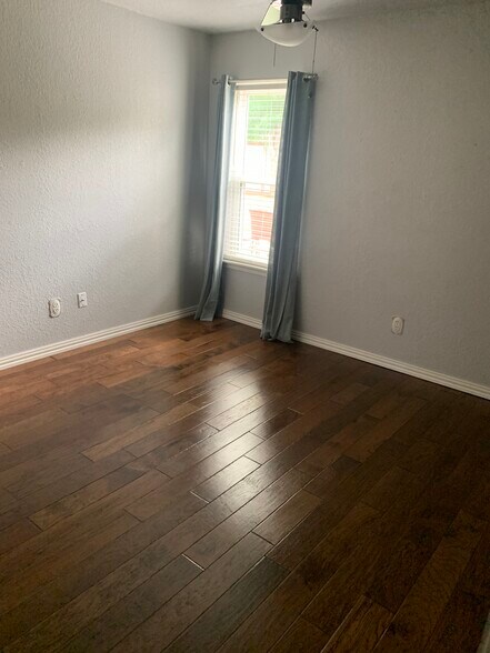 Wood floor in bedroom. - 4517 Newport Dr
