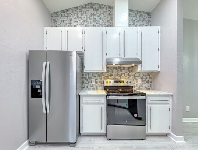 Building Photo - MODERN & Redone 1/1 w/ Tile Floors Throughout, Stainless Appliances, Granite Counters, Washer/Dry...
