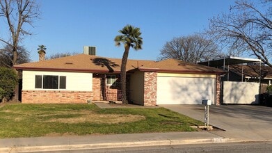 Building Photo - 3 bd, 2 ba, with in-ground pool & covered RV parking