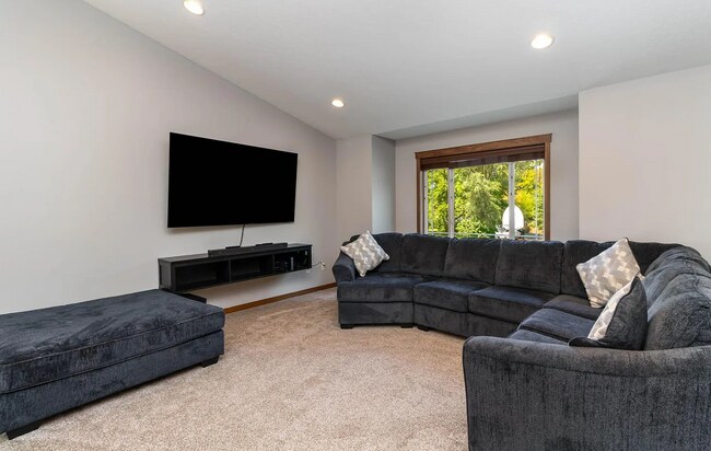 Building Photo - Modern 4BR Home with Fenced Yard + Garage ...