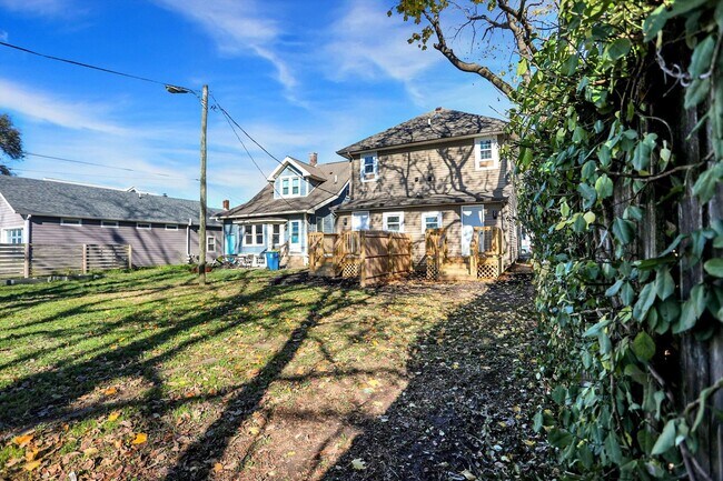 Building Photo - COMING SOON In February 2026  -   Modern, Chic and brand new 2 bedroom with an office.  Discover ...