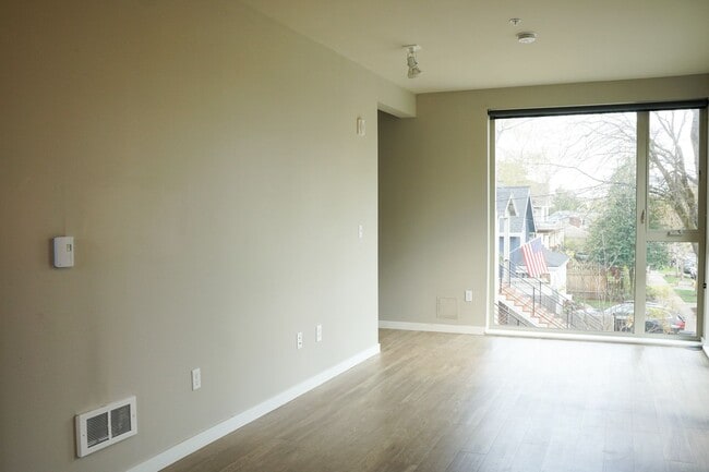 Building Photo - Corner 2nd Floor 1 Bdr w/Dishwasher, W&D, Condo Finishes!