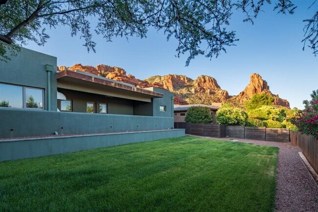 Building Photo - Exquisite Luxury Home Basking in Red Rock ...
