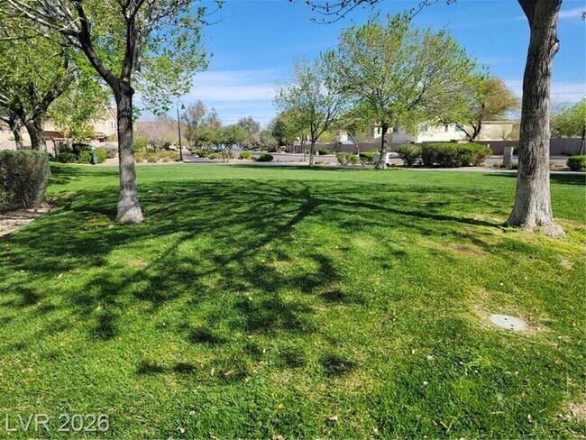 Building Photo - Gated Green Valley Condo with Dual Walk-In Closets & Resort Amenities