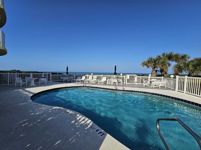 Building Photo - Seaside Serenity Awaits: Spacious 3-Bedroo...
