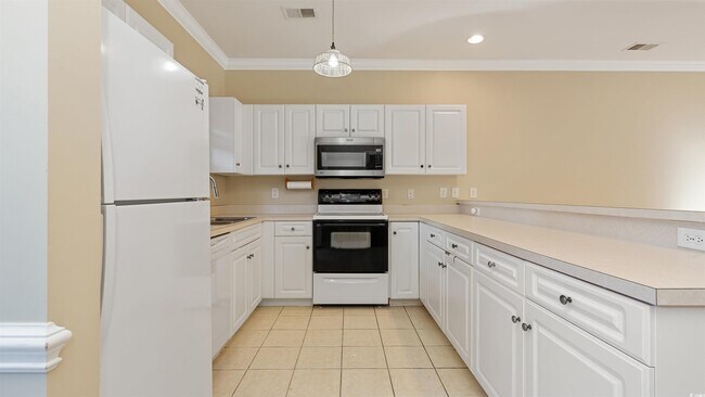 Building Photo - 4880 Dahlia Ct