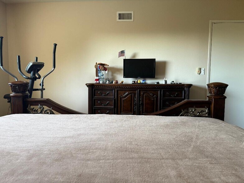 Master bedroom dresser & TV - 7010 Dennison St