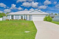 Building Photo - Spacious Three-Bedroom Home with Open Floor Plan, Large Yard