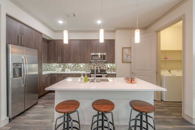 Building Photo - Experience the Art of Fine Apartment Living!