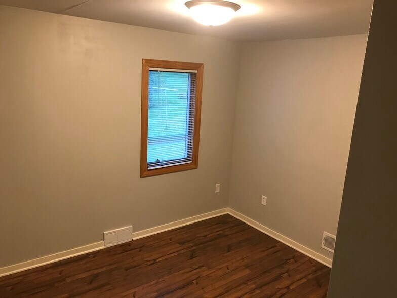 Primary bedroom on 1st floor - 404 21st St SW
