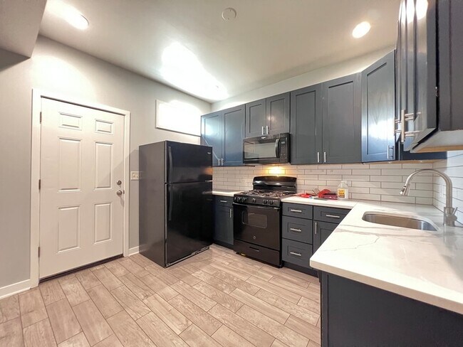 Building Photo - 6402 S Eberhart Ave