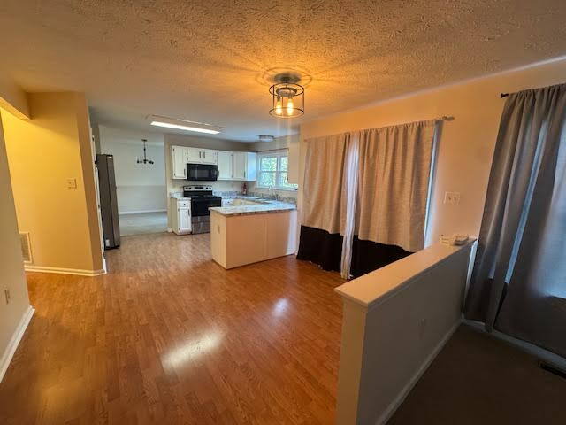 Building Photo - Spacious 4-Bedroom with 3 Full Baths & Fully Finished Basement. Available Now!