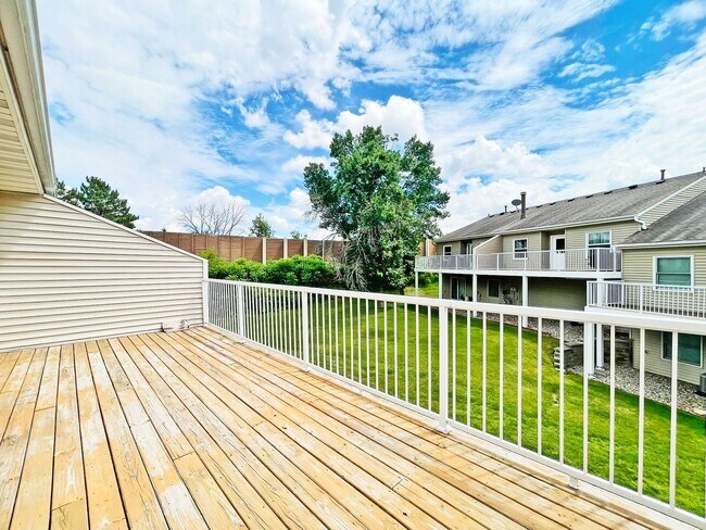 Building Photo - Beautifully Redone Modern Townhome with Large Deck, 2-Car Garage, Granite Kitchen, Vaulted Ceilin...