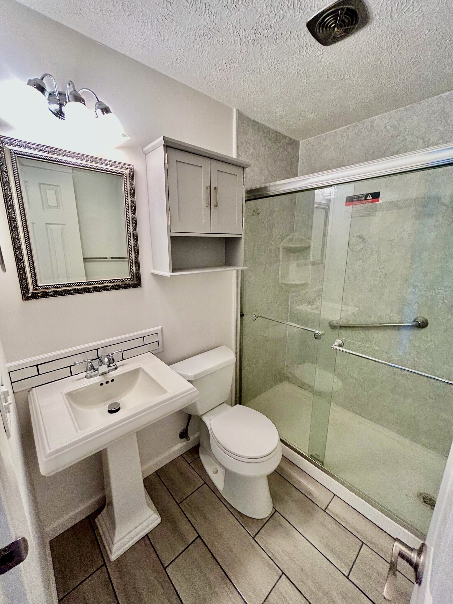 Bathroom featuring walk in shower - 5011 Nob Hill Dr