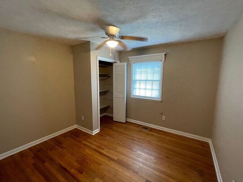 First bedroom on right - 6041 Elstree Pl