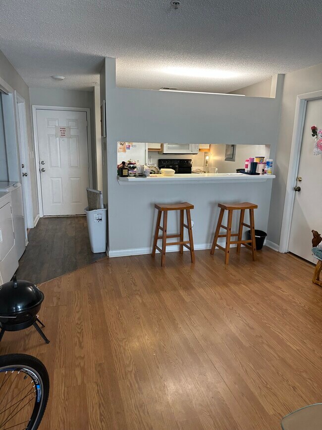 Unit 203: Living Room - 1221 University Ct