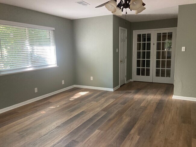 Den French doors leading to kitchen - 1704 W Birge St